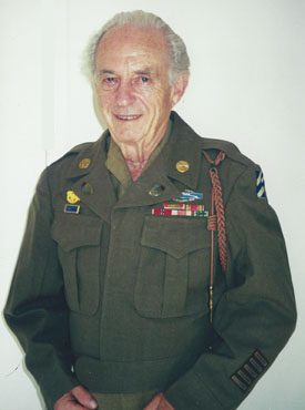Picture of Henry Landman as a senior citizen dressed in his army jacket